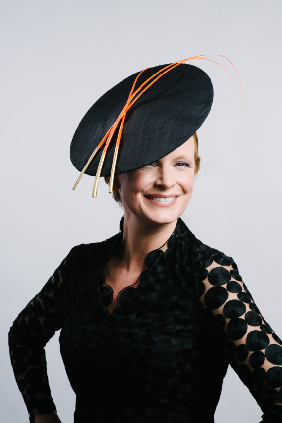 Black silk saucer with neon orange quills